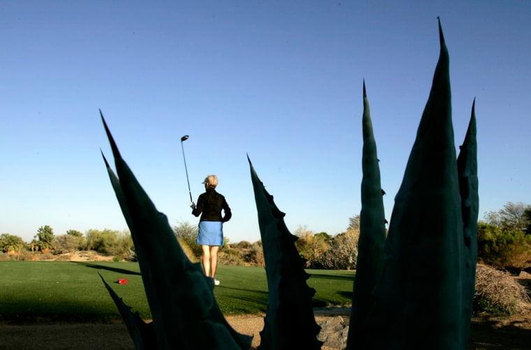 Image: Woman on a golf course