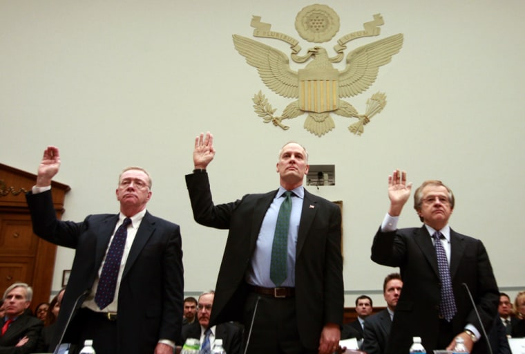 Image: Former CEOs of Fannie Mae and Freddie Mac are sworn in before testifying in Washington