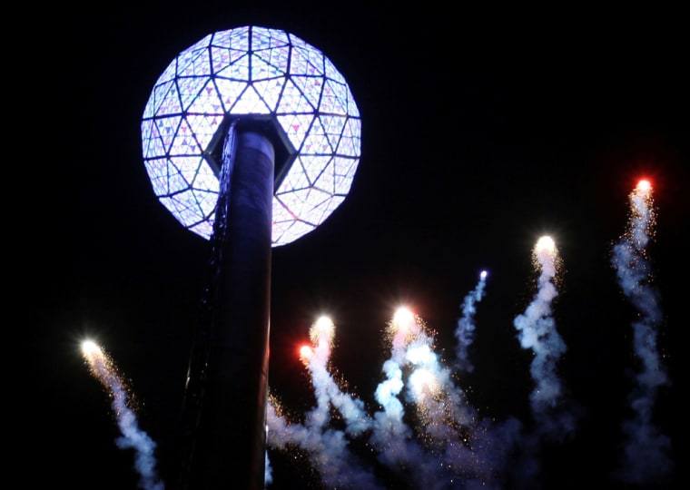 The New Year's Eve ball is surrounded by fireworks in preparation for its descent at midnight in New York's Times Square on December 31.