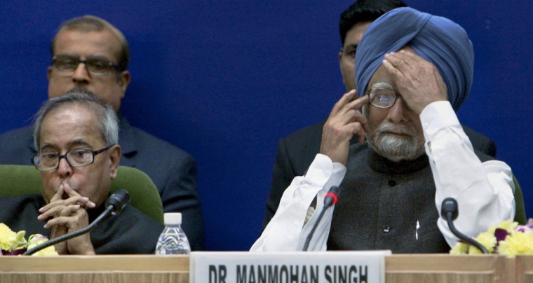 Image: Manmohan Singh, right, Pranab Mukherjee