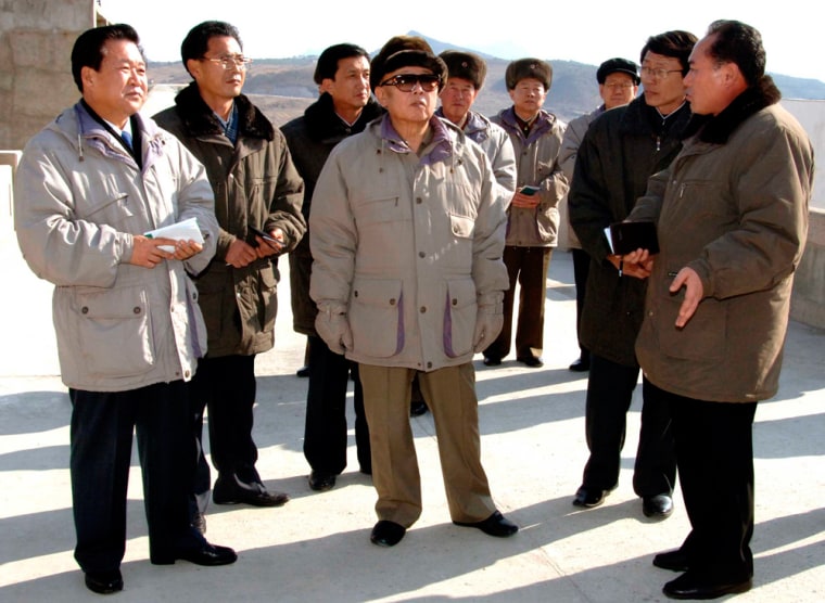 Image: North Korean leader Kim Jong-il visits the Ryesonggang Youth No. 1 water power plant at an undisclosed place in North Korea