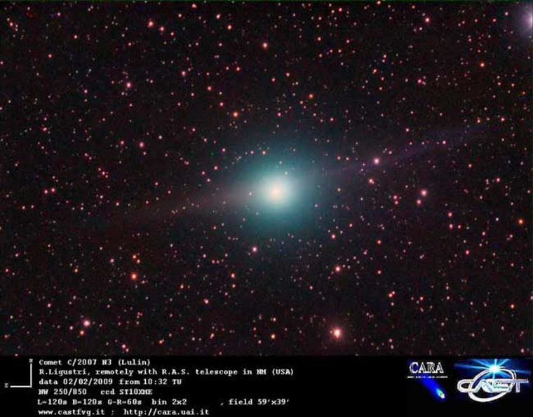 This image of comet Lulin was made Feb. 2, 2009 by Rolando Ligustri using the RAS Observatory in New Mexico. The green ball is the comet's atmosphere, or coma, measuring about 311,000 miles (500,000 km) wide, or three times the diameter of Jupiter. The coma contains cyanogen (CN) and diatomic carbon (C2), two gases that glow green when exposed to sunlight. Credit: R. Ligustri (www.castfvg.it), RAS Observatory, used with permission