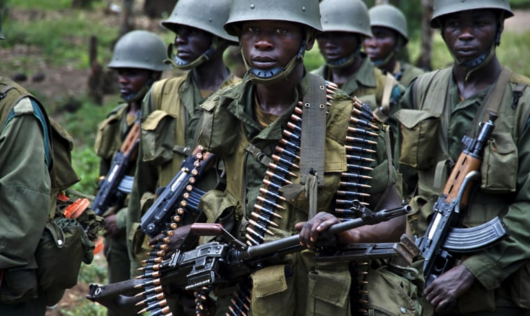 Image: Congolese soldiers patrol the town of Rutshuru in eastern Congo