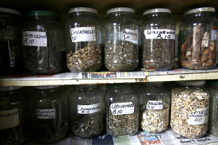 Bottles filled with traditional medicines are displayed on the shelves of a  merchant waiting for customers at the Mai Mai market in Johannesburg, South Africa, Wednesday Jan. 21, 2009. Dubbed \"Ezinyangeni'\" the place of healers, the Mai Mai market is dedicated to traditional medicine, or \"muti.\" (AP Photo/Jerome Delay)