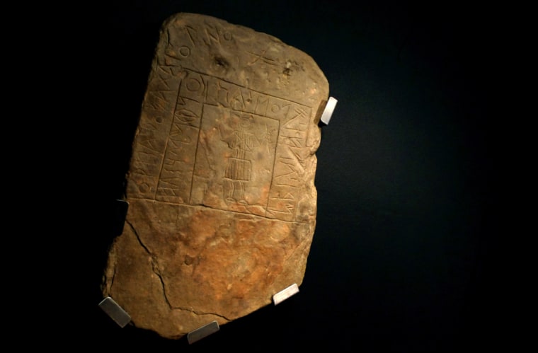 A stone tablet engraved with symbols at least 2,500 years old is seen at the Southwest Script Museum on Feb. 5 in Almodovar, southern Portugal. The museum has on display 20 tablets engraved with symbols of the Iron Age extinct Iberian language called Southwest Script. 