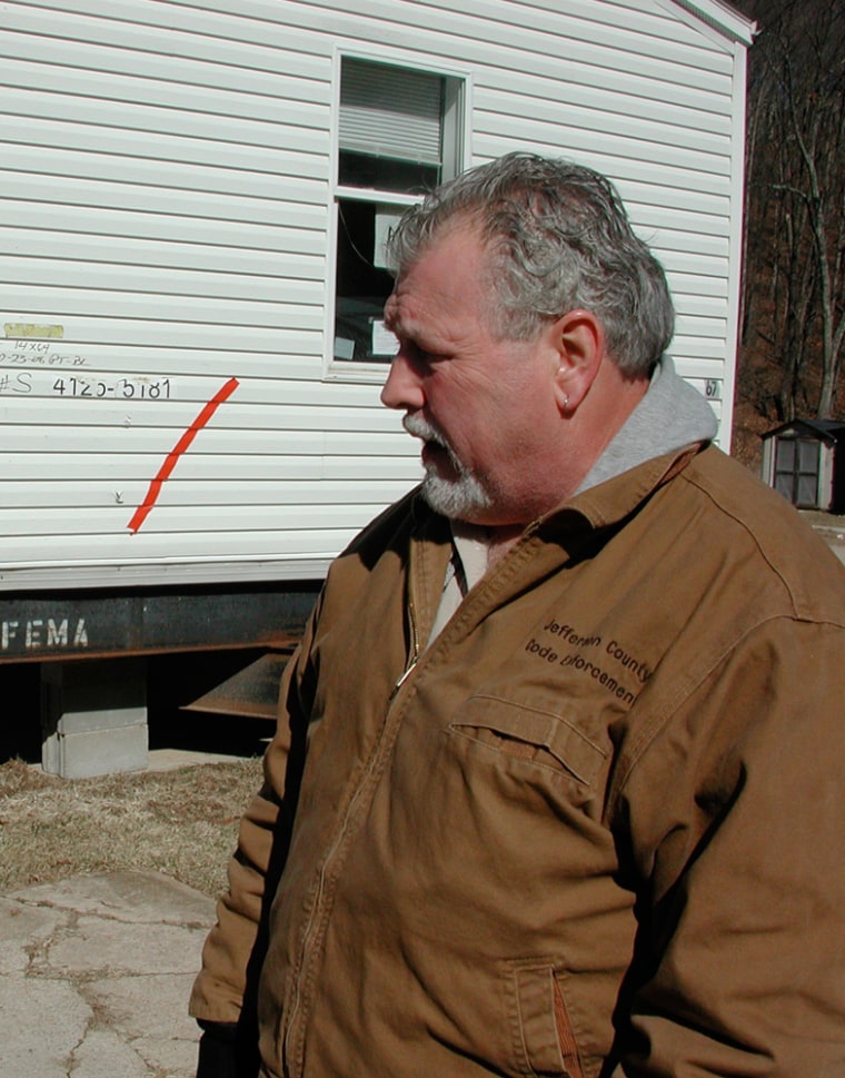 Caption: Jefferson County, Mo., building inspector John Webb