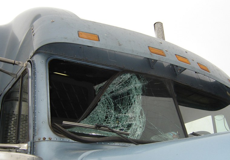 Image: Windshield of a semi truck that was shattered by a golden eagle