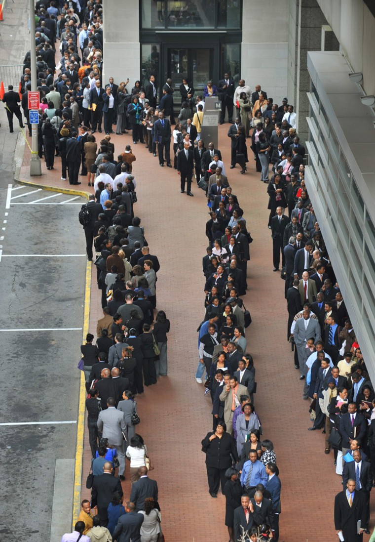 Image: Thousands of people line up at a federal government job fair in downtown Atlanta