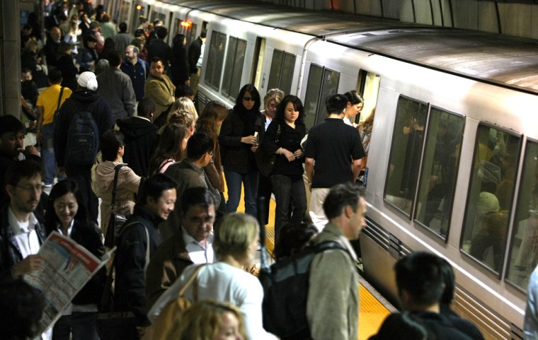 Image: Passengers board a train