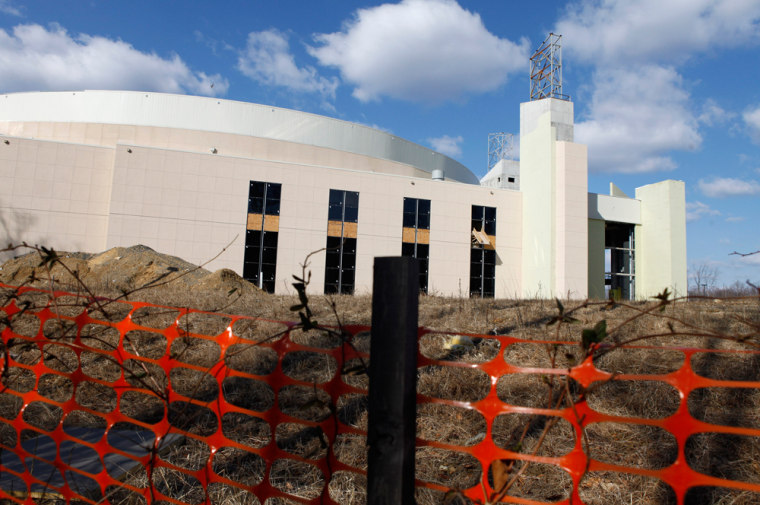 Image: The halted construction project for the new Metropolitan Baptist Church stands behind fences in Largo, Md.