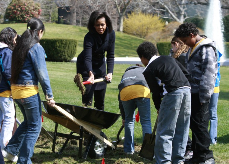 Image: U.S. first lady Michelle Obama breaks ground for White House Kitchen Garden