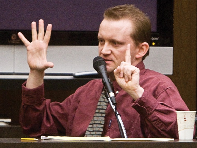 Image: Dale Hausner holds up six fingers