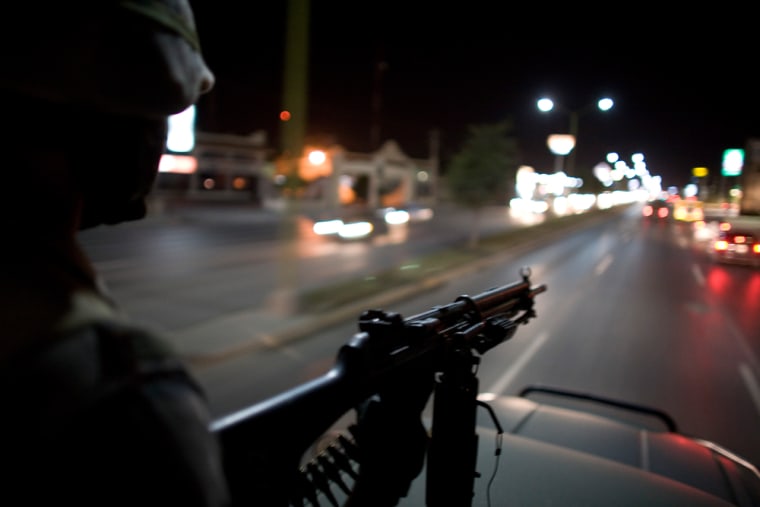 Soldiers patrol the streets of Reynosa, on Mexico's northeastern border with the U.S., Tuesday, March 17. 