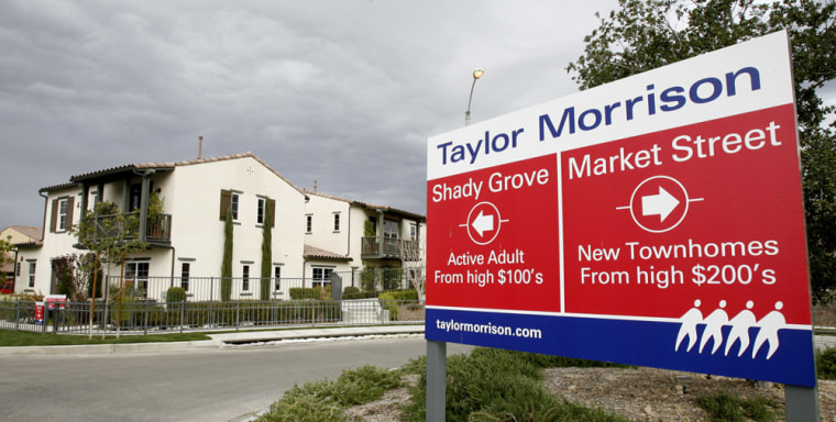 Image: A sign advertising homes for sale is seen in Corona