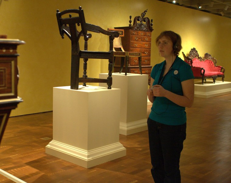Image: Maggie Weber trys out an iPod tour of a museum