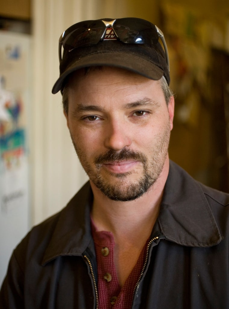 Terry Gonyon in the kitchen of the eight-bedroom home he was due to lose to foreclosure.