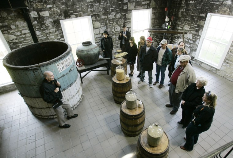 Image: guide Dave Salyers describes the bourbon making process