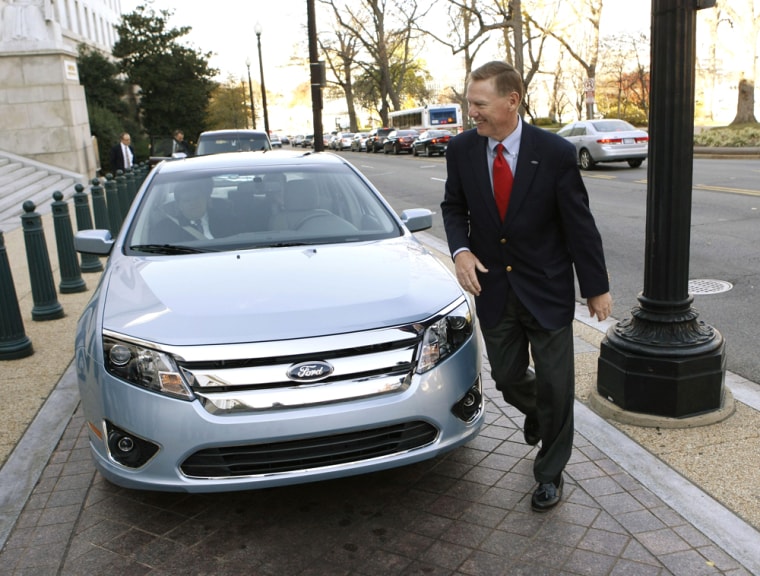 Image: Ford Chief Executive Officer Alan Mulally arrives on Capitol Hill