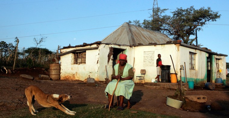 Image: Elizabeth Shange sits in yard of her homestead in KwaNxamalala, South Africa.