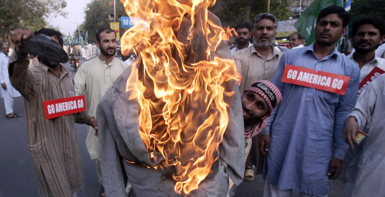 Image: Supporters of a Pakistani religious group 'Jamaat-e-Islami'