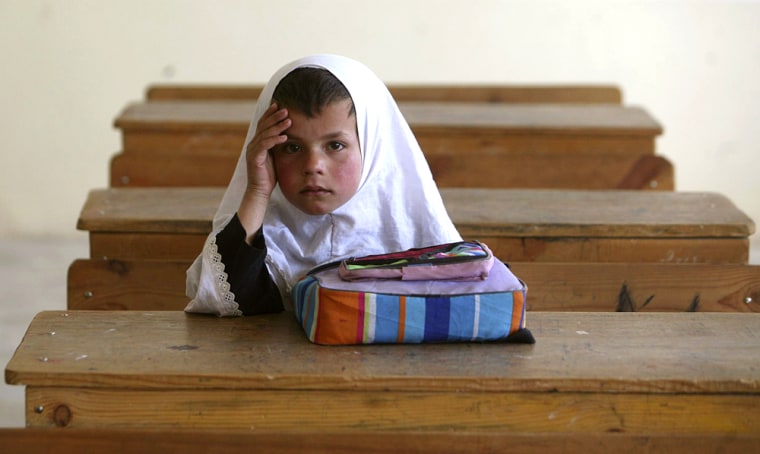 Image: Rukiya 8, an Afghan girl sits alone in her class room