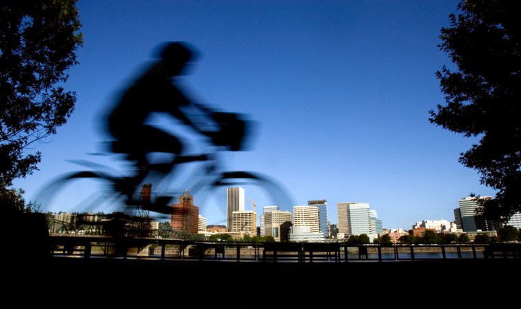 Image: Person rides a bike in Portland