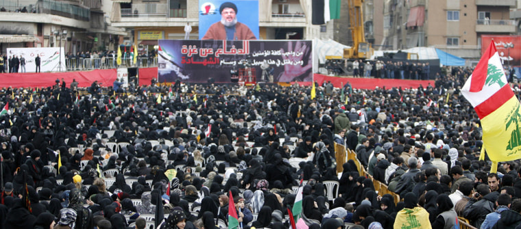 Image: Lebanese demonstrators listen to the speech of Hezbollah chief Hassan Nasrallah