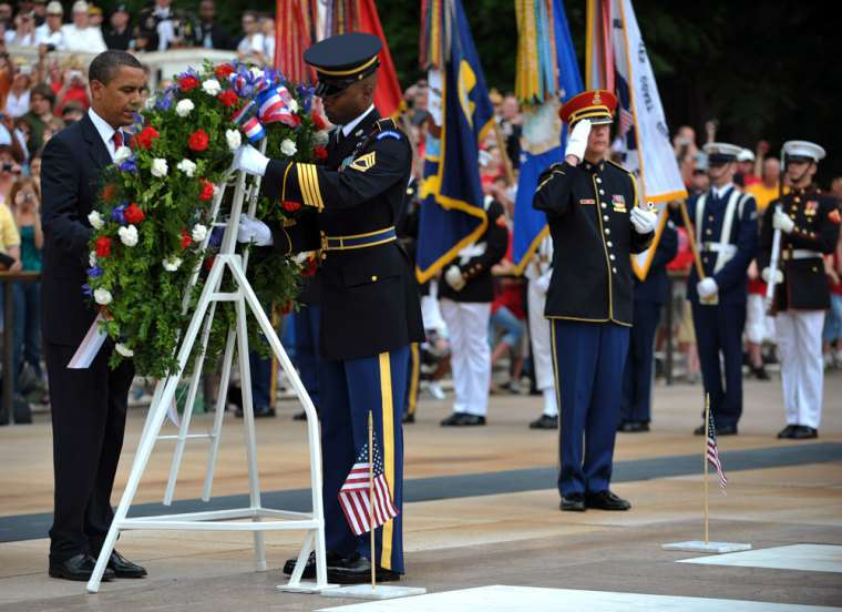 Image: U.S. President Barack Obama takes part in a wreath laying ceremony