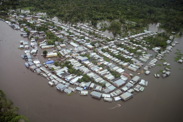 Image: An aerial view of the town of Anama, flooded by water from the Rio Negro