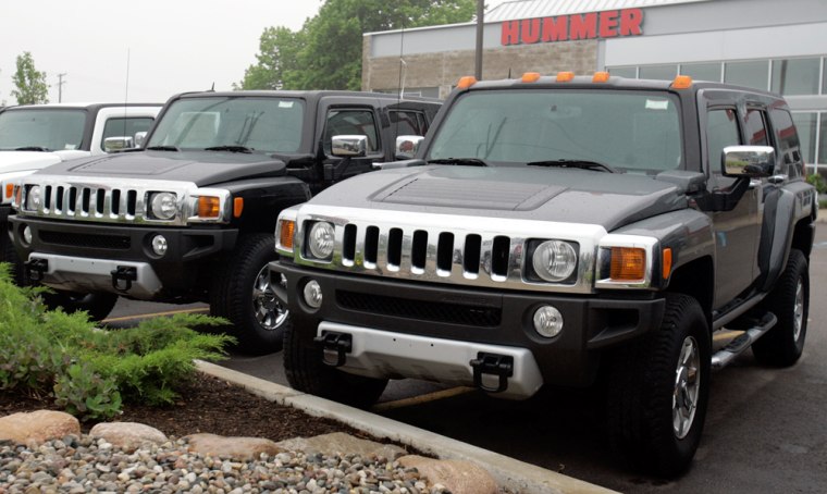 Image: Hummers are displayed on a sales lot in Troy, Michigan