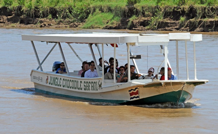 Image: crocodile safari for tourists