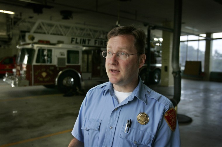 Image: Andy Graves, a primary captain in the Flint, Mich., fire department, talks about the challenge of fighting fires in the city's many vacant buildings