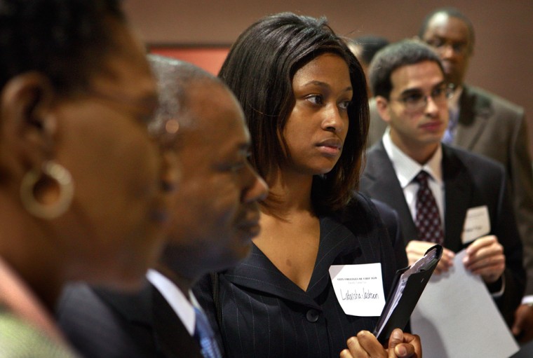Image: Job seekers listen to a recruiter during a job fair held by the City Colleges of Chicago June 4, 2009 in Chicago.