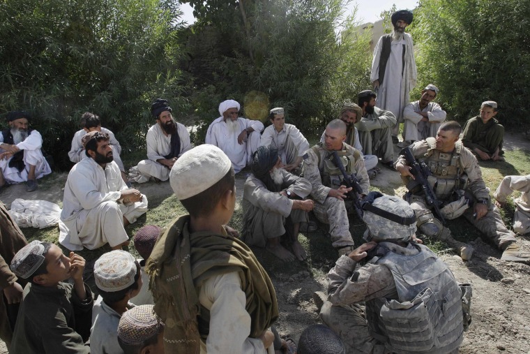 Image: U.S. soldiers meet with Afghan villagers