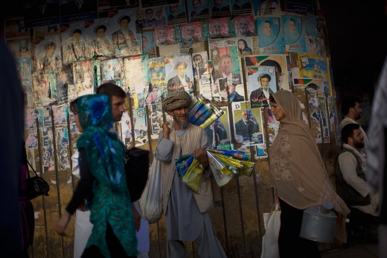 Image: walk past posters of provincial candidates