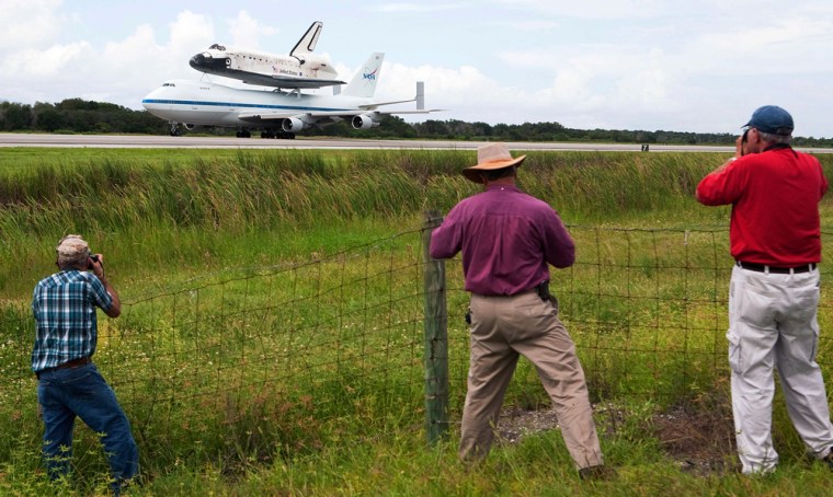 Image: Space Shuttle Discovery Returns To Cape Canaveral From California