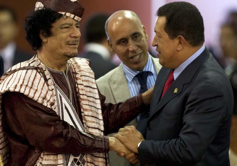 Image: Muammar Gaddafi greets Hugo Chavez