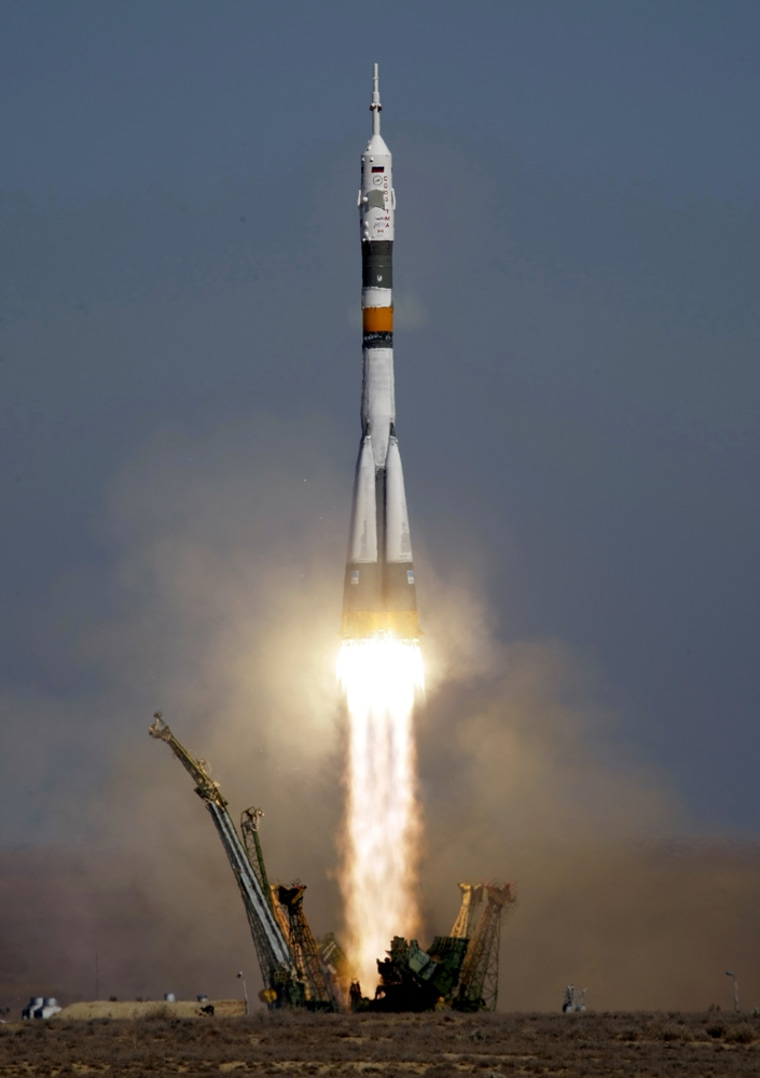 Image: The Soyuz-FG rocket booster with the Soyuz TMA-16 spacecraft