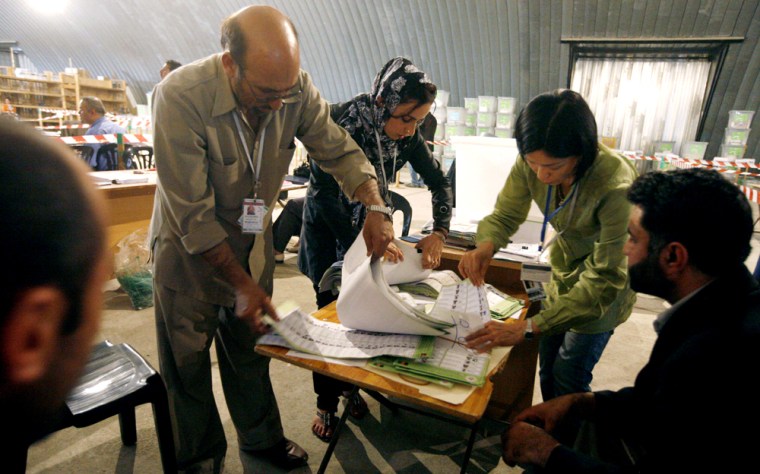 Image: Election workers recount votes