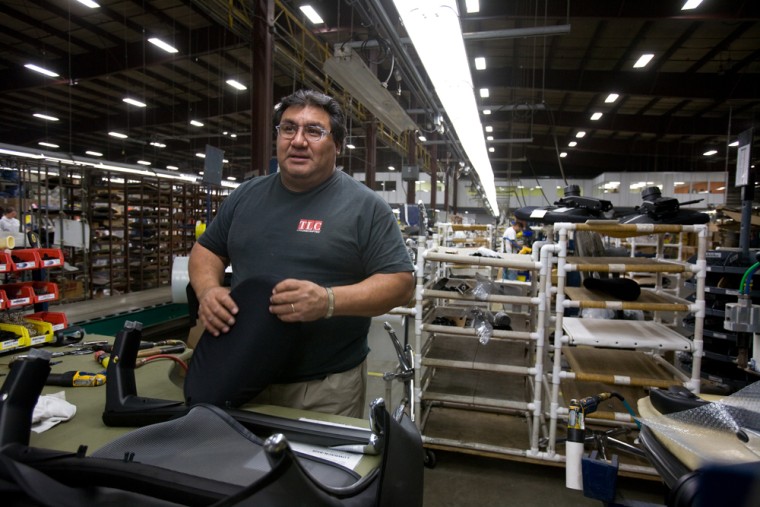 Image: Art Serna, working at the Izzy chair plant in Middlebury, Ind.
