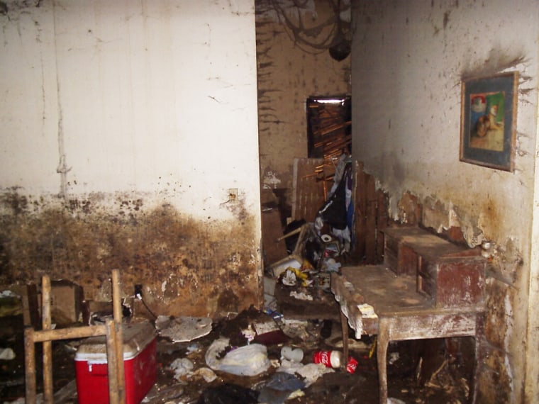 **ADVANCE FOR MONDAY NOV. 30** This undated photo provided by the Oklahoma City County Health Department shows the interior of the home of Kitty Lewis. The Oklahoma City woman's decomposing body was found in the mold- and cat-infested home in May. Compulsive hoarders are in the spotlight this year, because of books, movies and TV shows about the disorder.(AP Photo/Oklahoma City County Health Department,Troy Skow)**NO SALES**