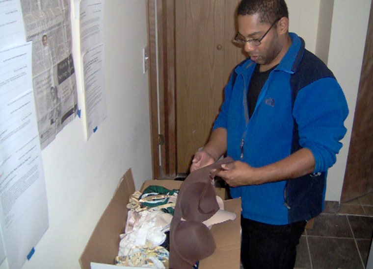 Image: Soleil checks some of the bras he has collected to donate.