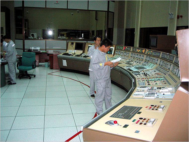 Image: Nuclear plant trainees working at a simulator in a Chinese training center