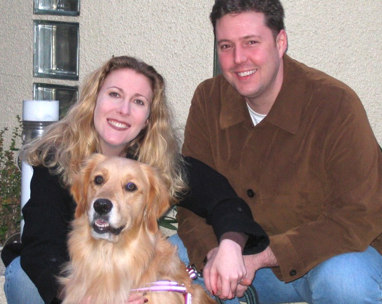 Image: Rachel Yould with her husband and dog