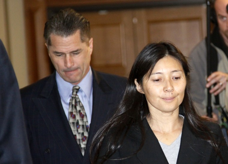 Image: Richard and Mayumi Heene arrive at Larimer County district court in Fort Collins