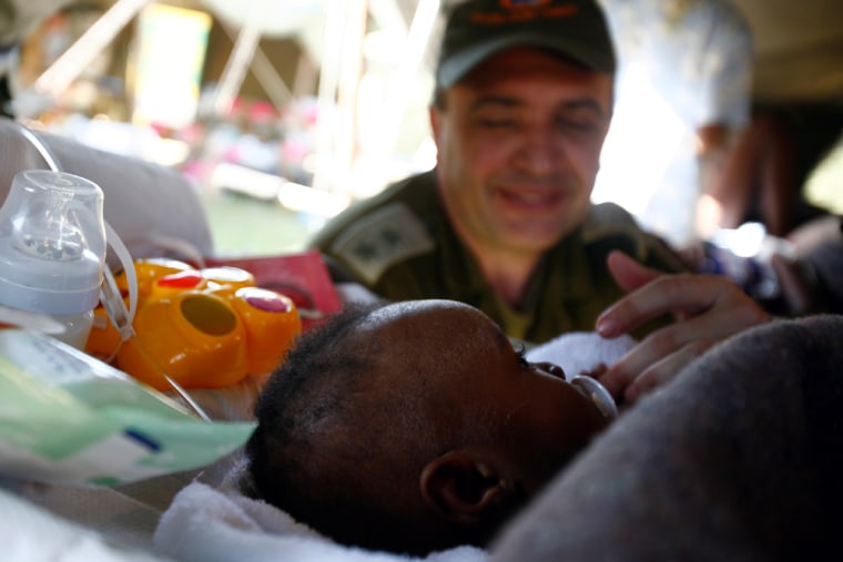Image: A five-month-old baby boy is nursed by Avi Berman