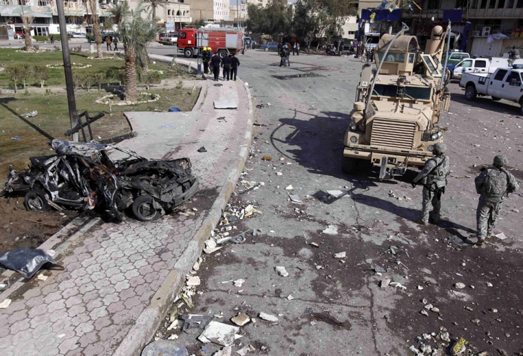 Image: Site of a car bomb attack in central Baghdad