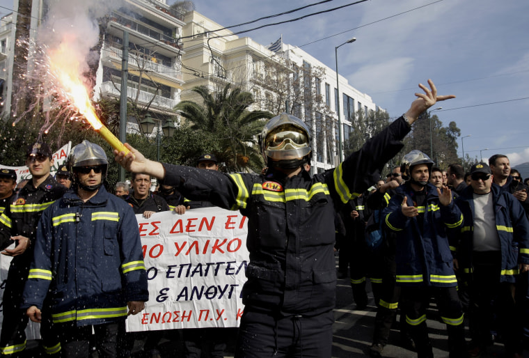 Image: Firefighters protest outside Greek Parliament