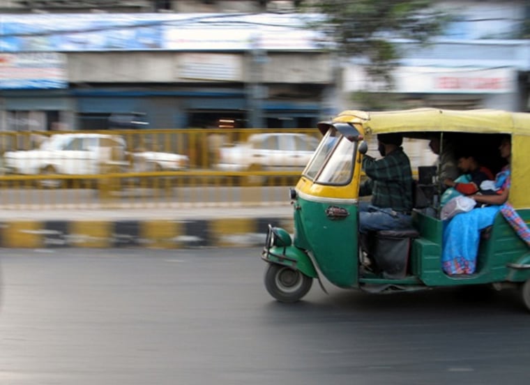 Happy auto rickshaw driver coloring page