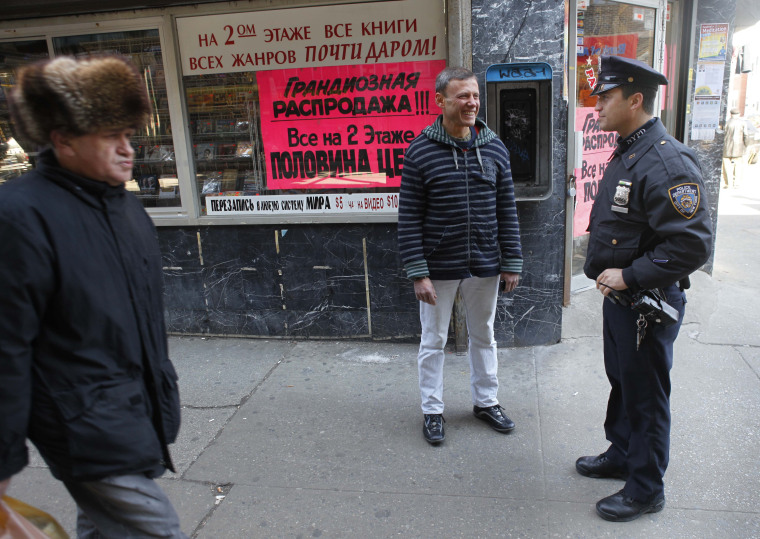 Image: NYPD officer speaking Russian